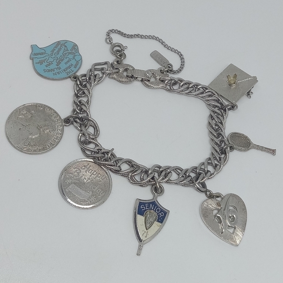 * vintage Monet silver charm bracelet 7 charms 4 are 925 sterling silver - Picture 1 of 6